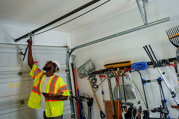 Professional Garage Door Installation technician working in Springfield, OR